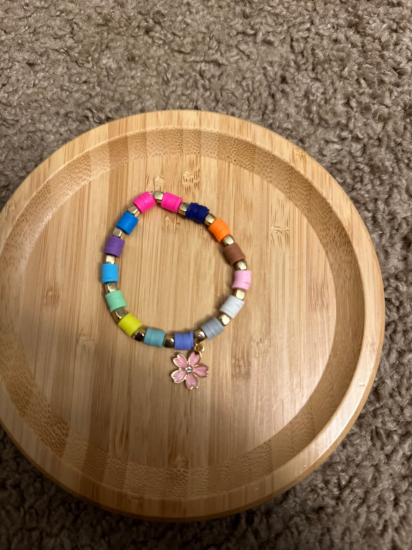 Rainbow with pink flower